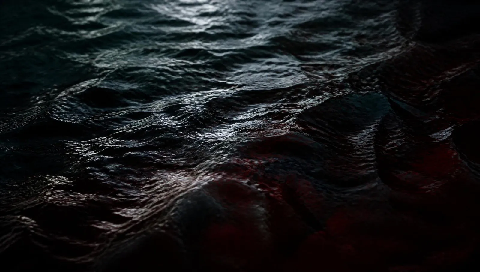 Dark water rippling at night